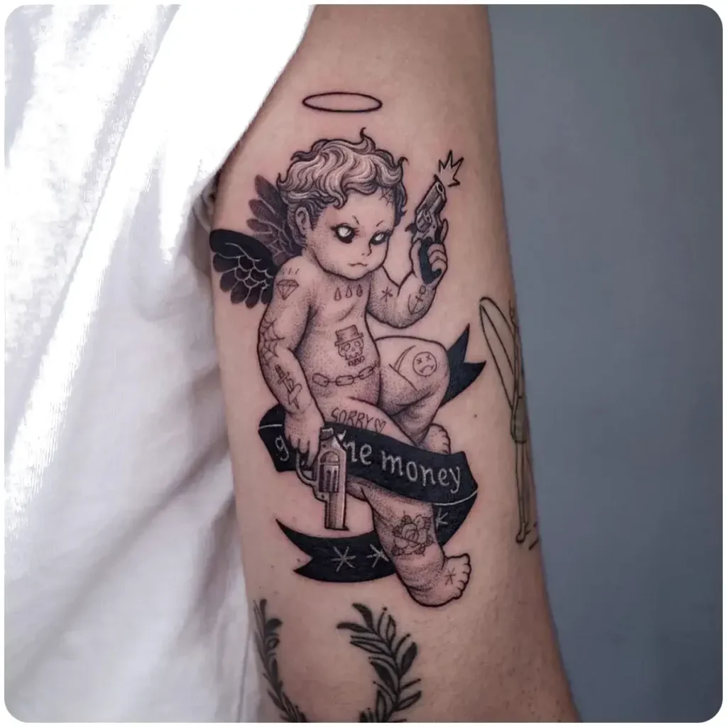 tatuaggio angelo pistole