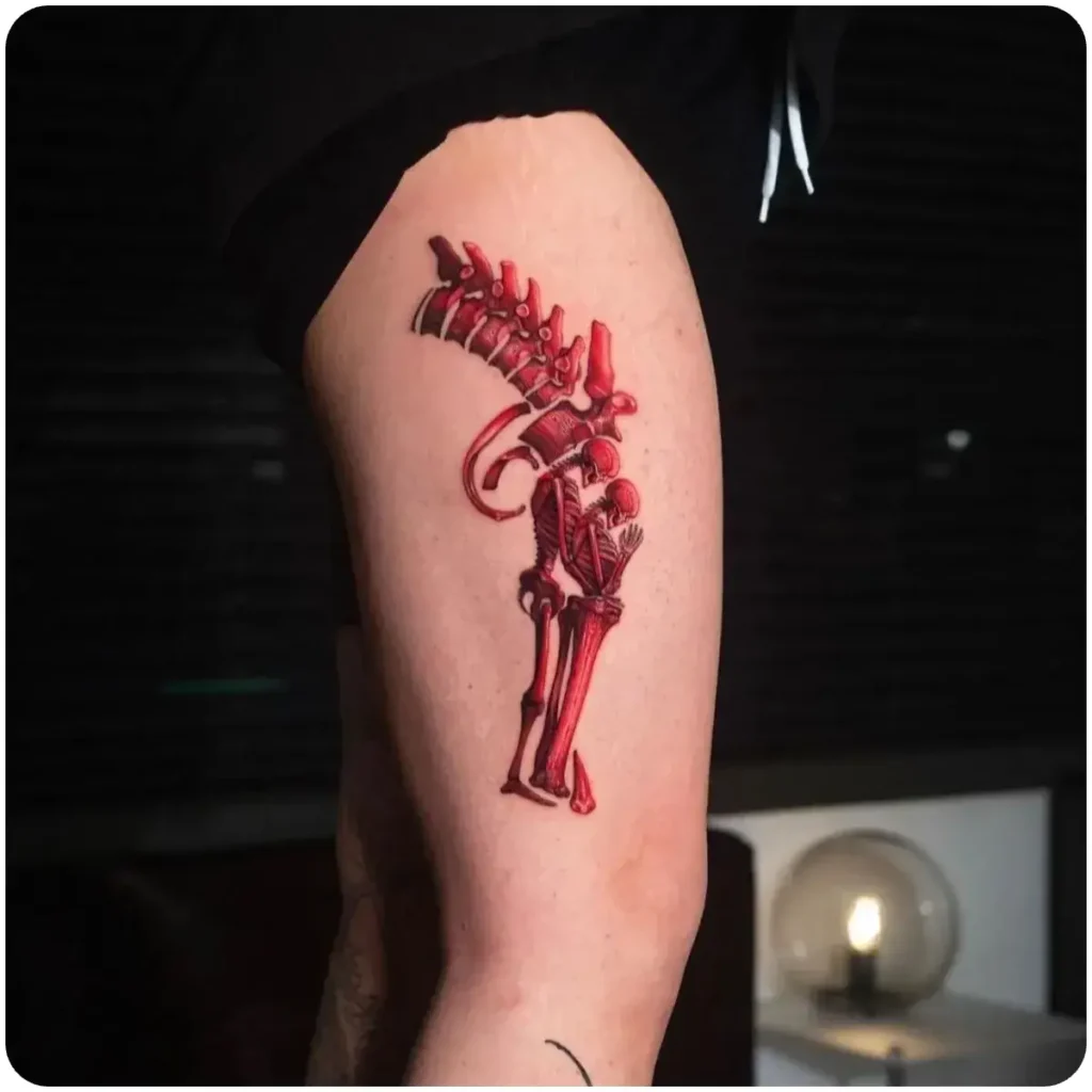 tatuaggio pistola scheletri coscia